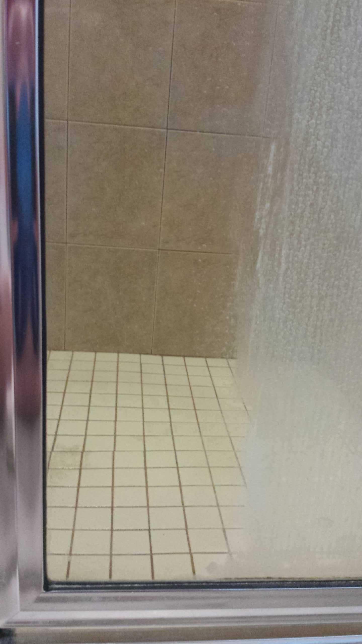MARBLELIFE SOAP AND SCUM REMOVER EXAMPLE ON GLASS SHOWER DOOR